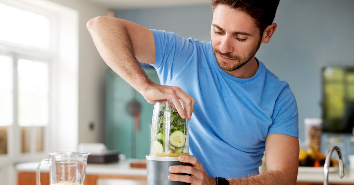 Detoxing Your Liver Man making smoothie