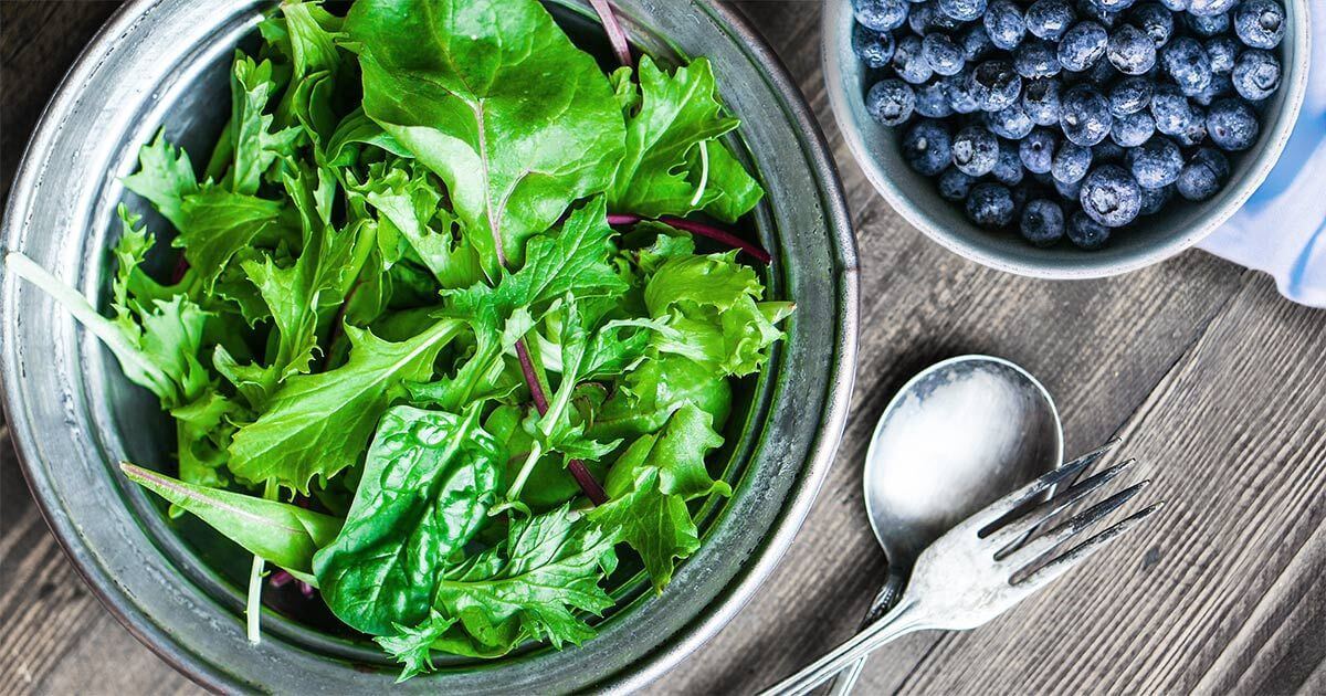 salad and berries on a table